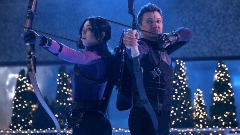 Collage of Hawkeye characters and scenes, with a 'near-disaster' theme.