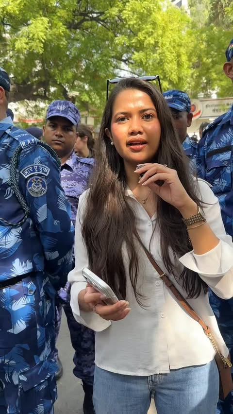 Instagram Reel by @peektv_in, published Jun 6, 2026. #PeekOnGround: A ‘Cockroach’ tries to give flowers to security personnel at the Parliament Street Police S…