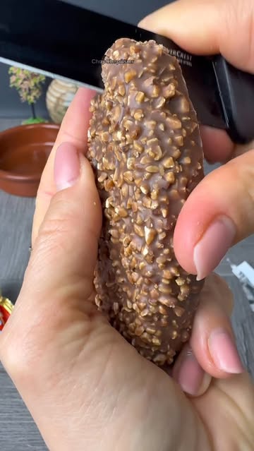 Instagram Reel by @chopchpoasmr, published May 27, 2026. ASMR peeling kinder king #asmr #knife #food