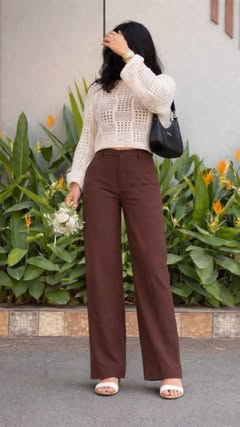 Instagram Reel by @sakshu_eraa, published Apr 21, 2026. “Follow me & DM ‘LINK’ ? I’ll send you the details ?✨” . . Elegant neutral outfit ?? Beige crochet knit…