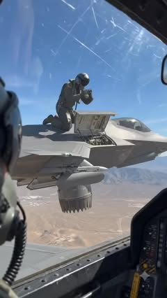 Instagram Reel by @alex_roushan_x, published Jun 1, 2026. Nobody Expected a Pilot to Repair a Jet at 30,000 Feet ? A fighter jet hovering over snow-covered mou…