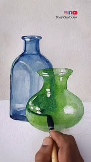 Instagram Reel by @shajichaladan, published May 27, 2026. Chasing light through transparent watercolor ✨ Still life study with glass reflections. #art #artist…