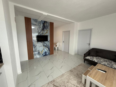 Banesa me qera per Mergimtar